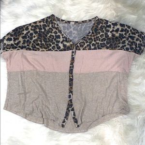 Button up cheeta shirt.